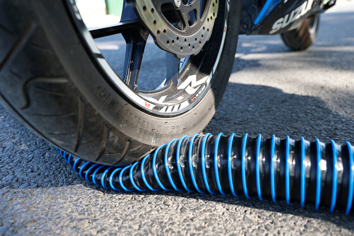 RV Sewer Hose Tested by a Suzuki Motorcycle? Here’s What Survived
